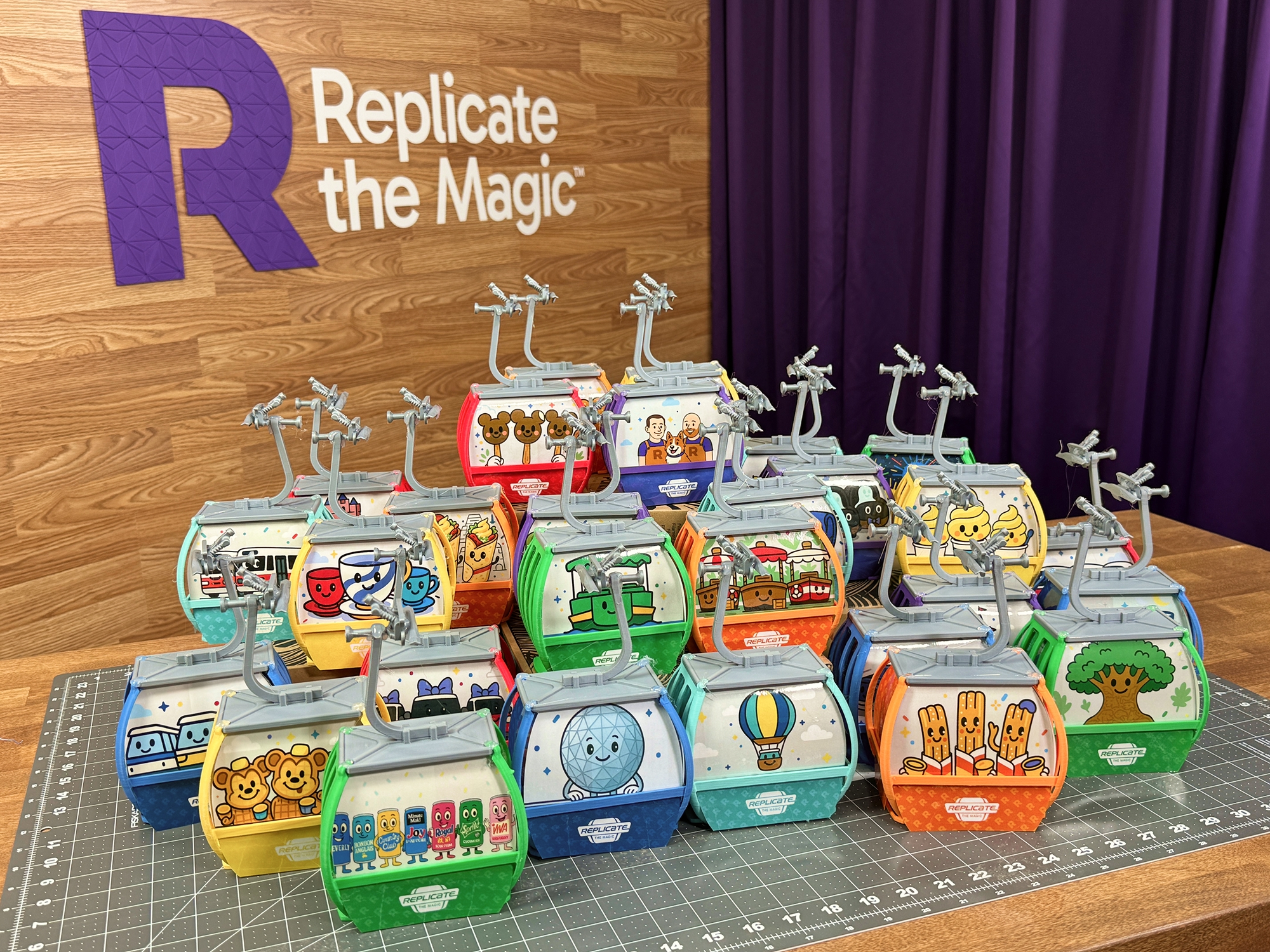 Miniature Disney Skyliner gondolas featured in a Replicate Workshop project