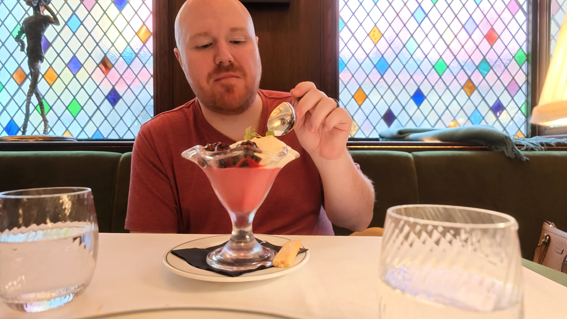 Sean trying blackberry posset at The Ivy.
