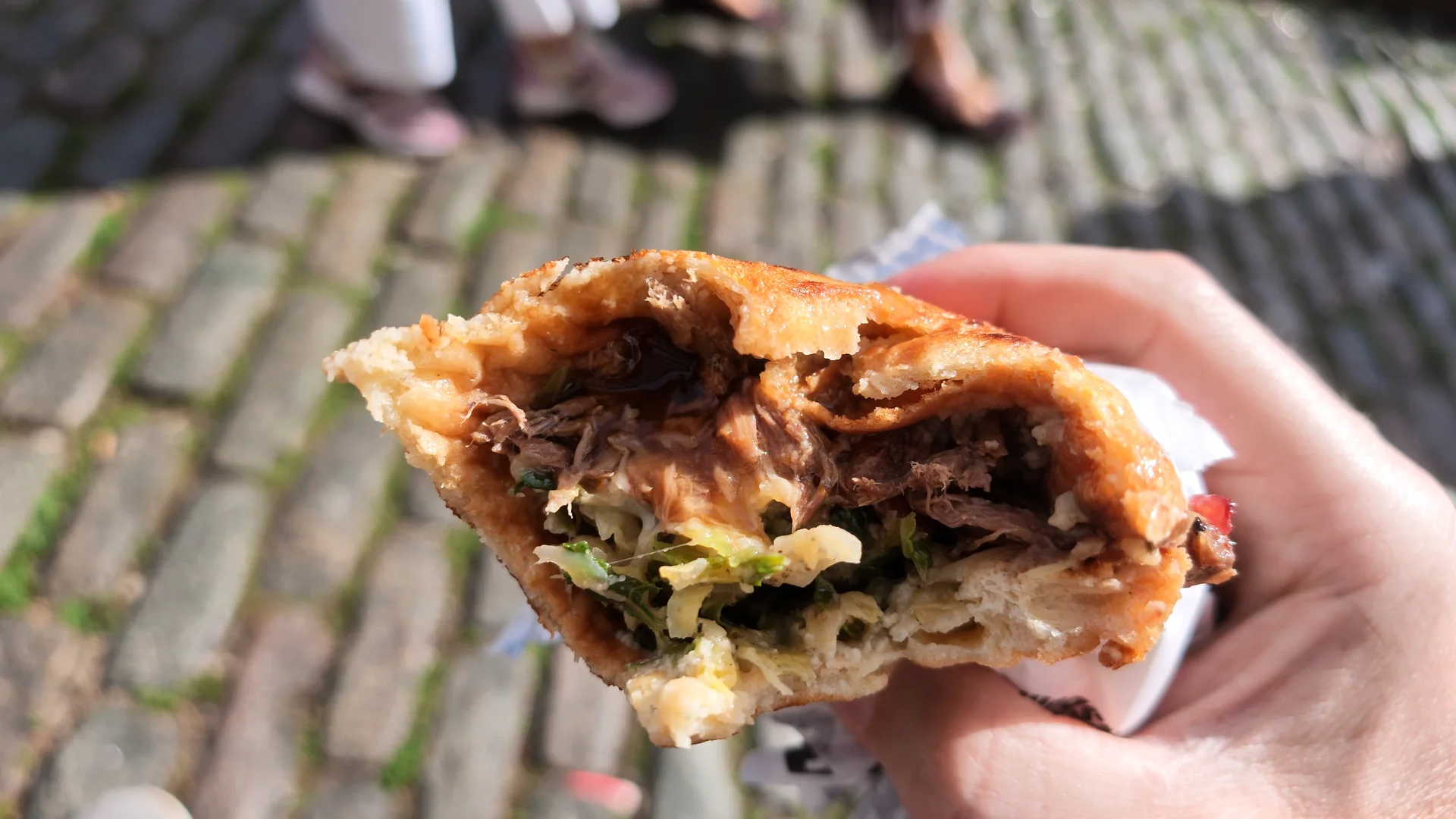 The cut end of a beef Yorkshire Burrito at Camden Market.