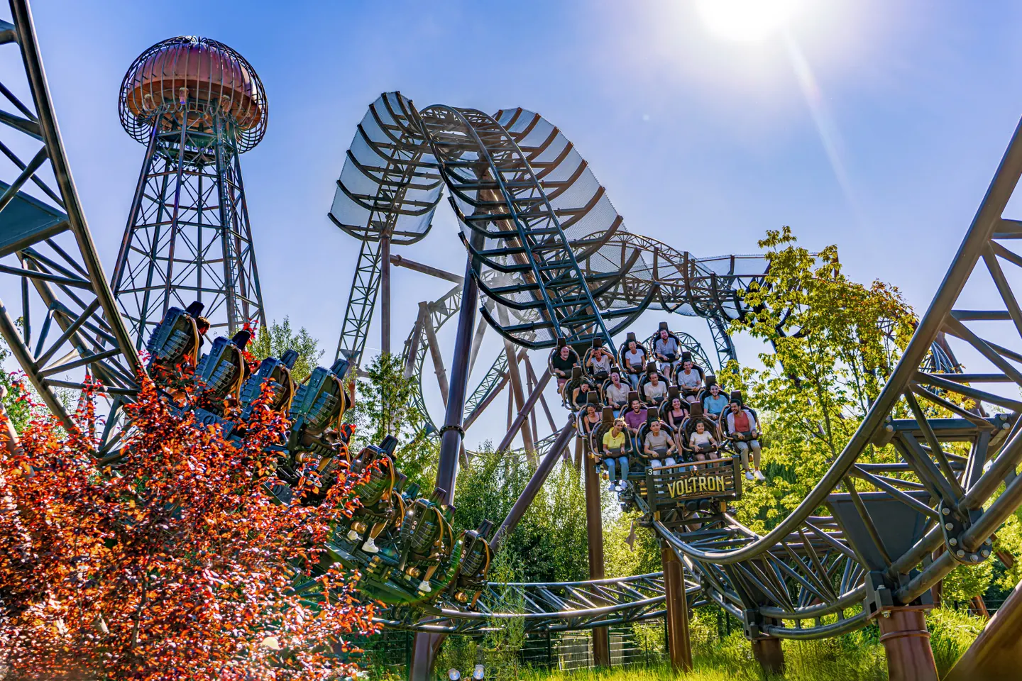 A Voltron Nevera coaster train following its track through the Croatian themed area.