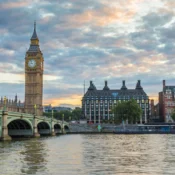 Westminster Bridge, Elizabeth Tower, and the River Thames beneath a colorful sky