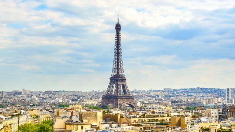 The Eiffel Tower above the Paris skyline in daylight